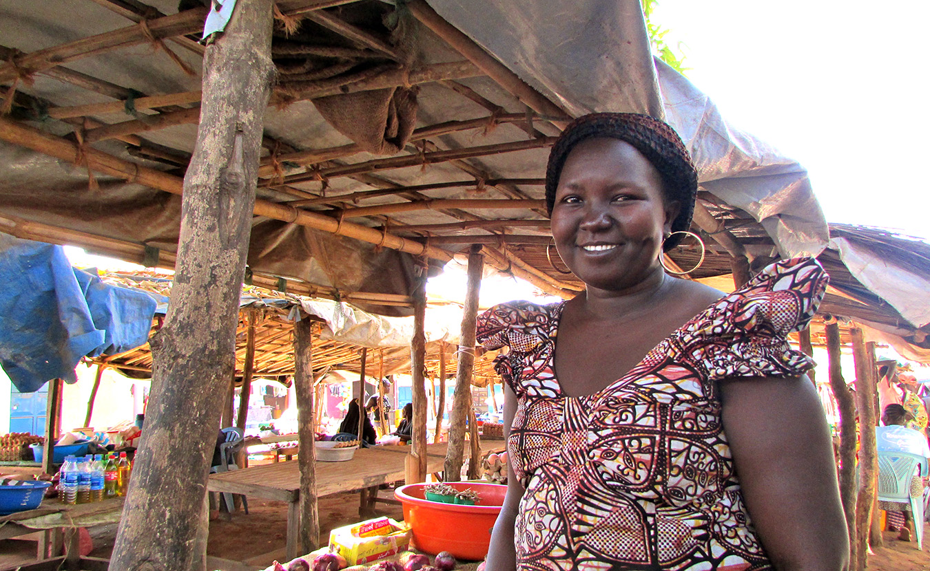 Mary, Theresa’s language helper, at her booth at the Mundri market. | Photo by Will and Theresa Reed