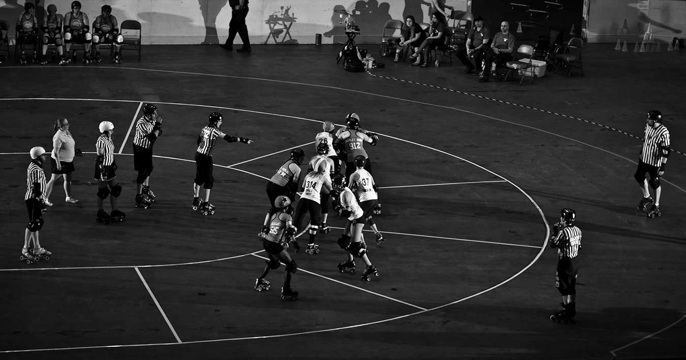Tofu (second from left) spends many of her weekends traveling for roller derby, including with Bleeding Heartland Roller Derby, pictured here competing in Nashville, Tennessee, in 2014. | Photo by <a href="https://www.flickr.com/photos/claymanphotography/" target="_blank">Cory Layman</a>