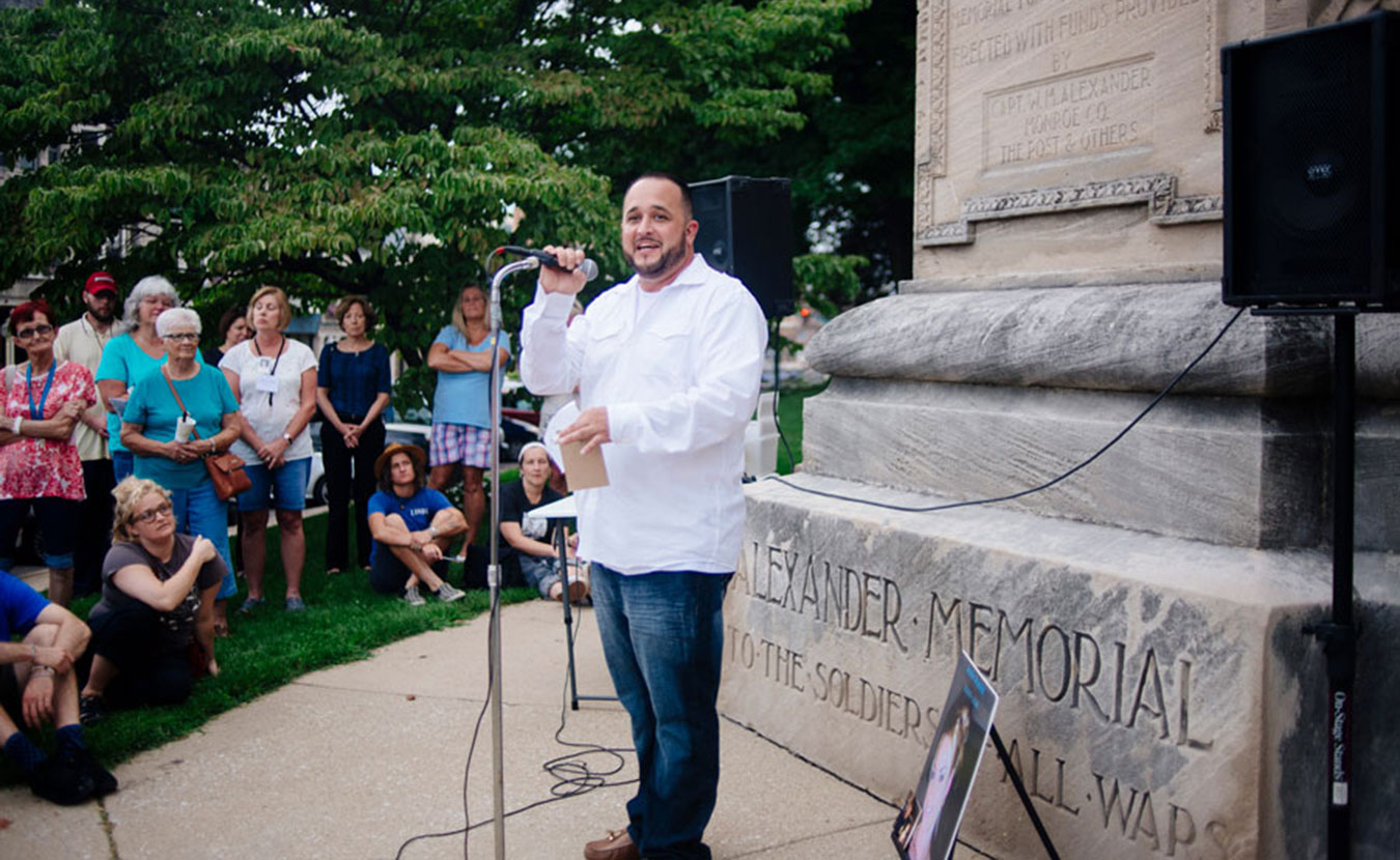 Last year, Brandon Drake, co-founder of Courage to Change, spoke during a vigil at the Monroe County Courthouse Square to remember loved ones lost to drug overdoses. | Photo by Natasha Komoda