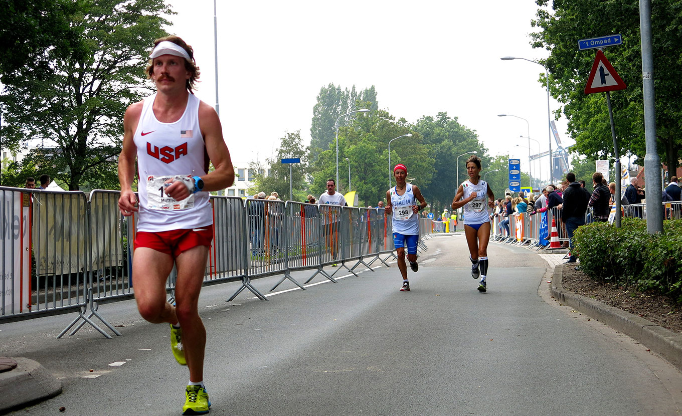 Flaherty, left, runs in the 2015 100km World Championships in Winschoten, Netherlands. | Photo by Guido Gallenkamp