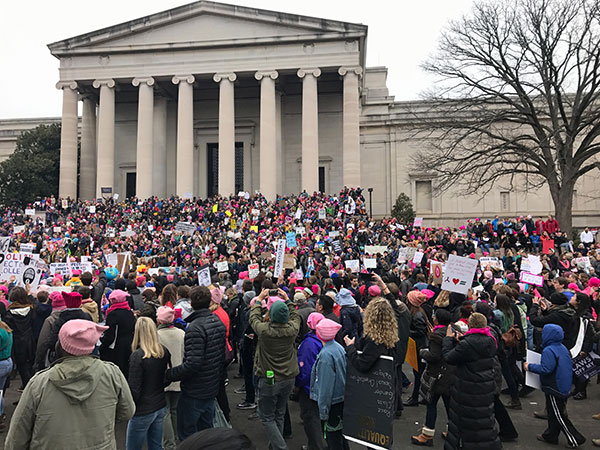 Marchers gathered on the steps of the National Gallery of Art on Saturday morning. | Photo by Lynae Sowinski
