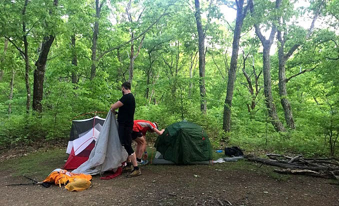 Waterford, left, and friends set up camp with minimal gear. | Courtesy photo