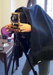 Photographer Adam Reynolds gets his large-format camera ready. | Limestone Post