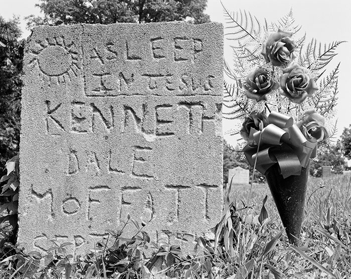 This photo, taken by Wolin in 1984, shows a handcarved grave marker inscribed with “Asleep in Jesus,” with a backward “J.” | Photo by Jeffrey Wolin