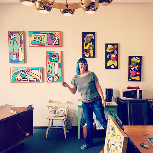 LP has a beautiful office on the courthouse square, filled with abstract paintings by local artist Carrie Markey.