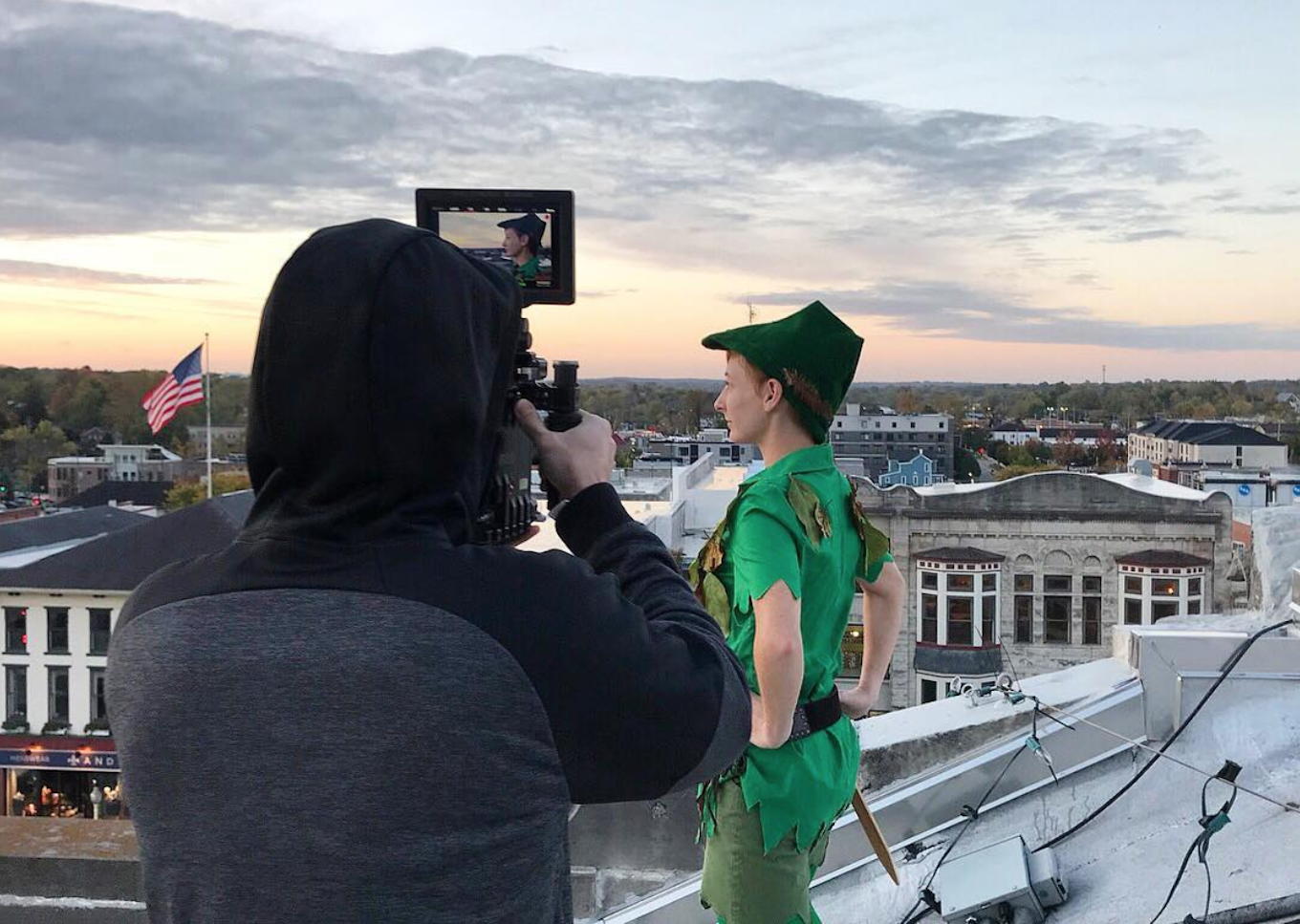 Peter Pan surveys the Bloomington sunrise from atop the Monroe County Courthouse during a Blueline photo shoot.