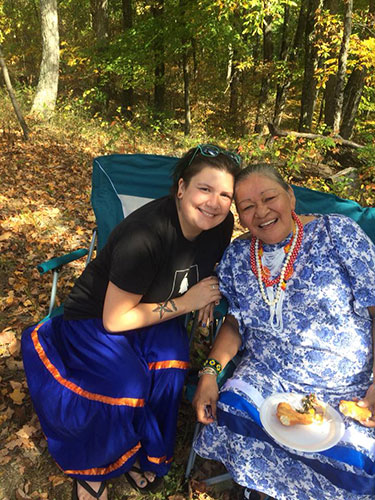 Halloween costumes perpetuate the mistaken idea that Native Americans are one homogenous culture and that they are stuck in the past. In this photo, Martinez, left, who is wearing a T-shirt with a traditional Apache skirt, sits with friend Margie King, a citizen of the Anishinaabe tribe. | Courtesy photo