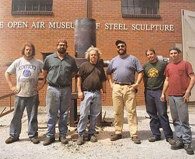 Ironmen, circa 2001. From left, University of Kentucky students Casey McKinney and Bill Rainey, Alabama Art Casting President Rick Batten, University of Kentucky Dept. of Art Chair Jack Gron, and University of Kentucky graduate students Ryan Goff and Gerry Masse. | Courtesy photo