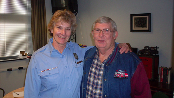 Magrane stands with her original capitan (who later became battalion chief), Bill Headley, on her retirement day. | Courtesy photo