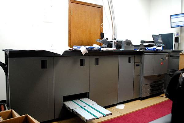 A large printing rig sits in a back room of TLC's offices. This rig is primarily used for printing booklets in a variety of indigenous languages. | Photo by Nicole McPheeters