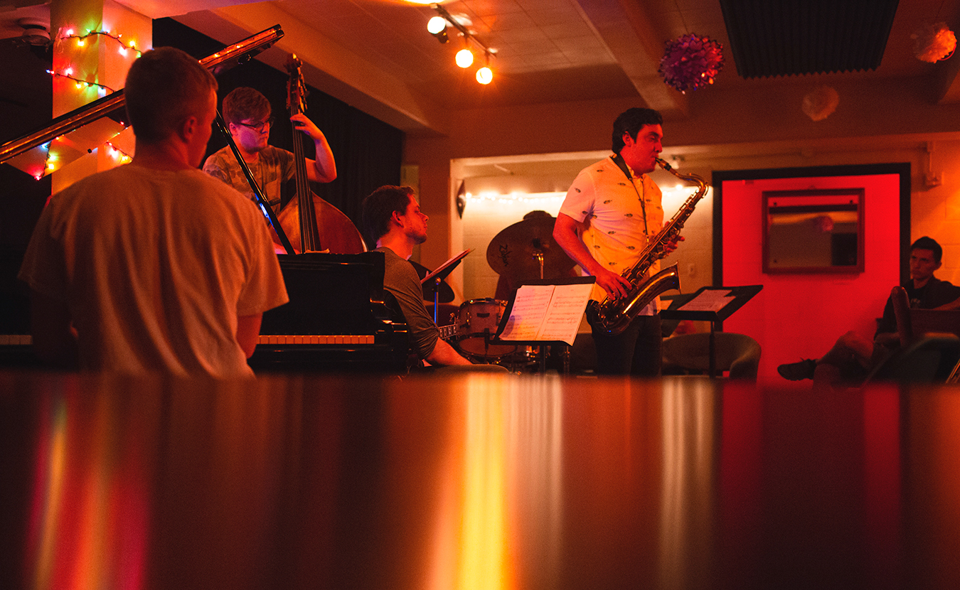 (l-r) Evan Main (piano), Philip Wailes (bass), Connor Evans (guitar), and Barclay Moffitt (tenor sax) perform at Blockhouse Bar in June. | Photo by Chaz Mottinger