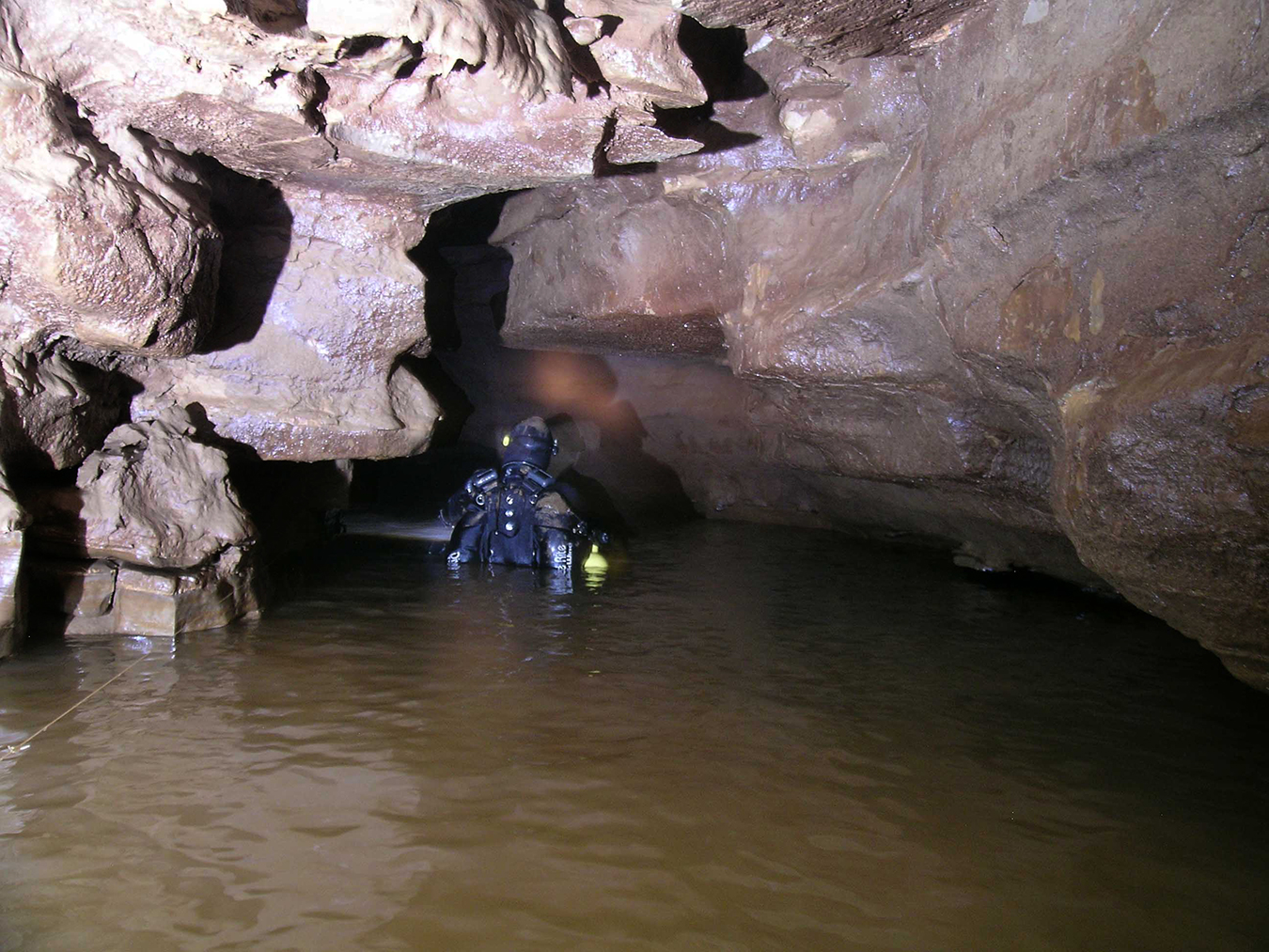 Divers must bring a variety of equipment to keep safe throughout the cave. Some sections have air pockets (as shown here) but others are completely filled with water and silt, making it difficult to see. | Courtesy photo
