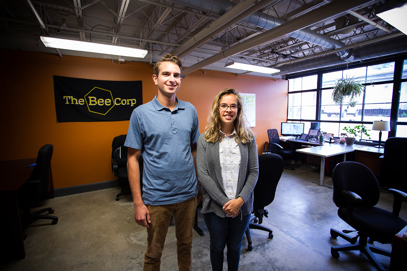 Wyatt Wells, left, and Ellie Symes of The Bee Corp say that more and more people value B corps and their commitment to "doing good." | Photo by Chaz Mottinger