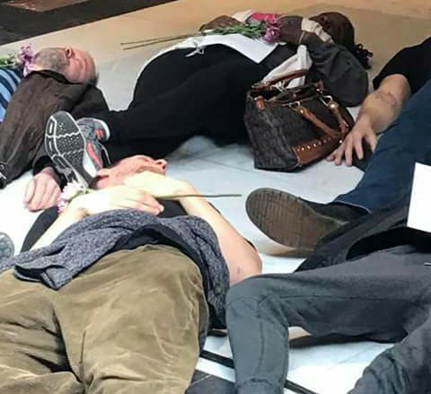 Activists symbolically die at a protest at the Statehouse. Thrasher and other local activists organized a similar action at the mayor's house, but was cancelled once the City removed sensitive information about local drug overdose deaths from their website. | Courtesy photo