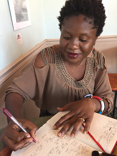 Eastina Marian Boimadi Taylor, a Mandela Fellow from Freetown, Sierra Leone, at a meeting in Soma Coffeehouse during her stay in Bloomington. | Limestone Post