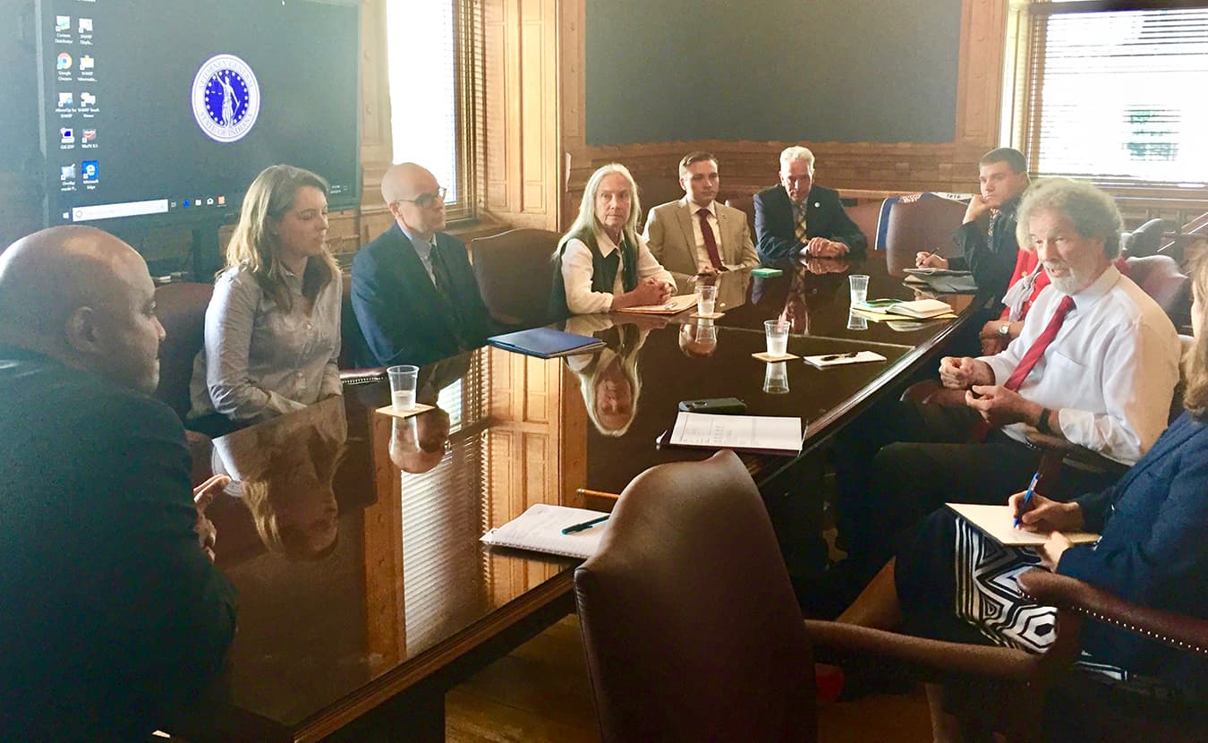 Stone, right, and a number of other healthcare activists met with Indiana Attorney General Curtis Hill Jr., left, in August to discuss the protection of the Affordable Care Act and The Healthy Indiana Plan. | Courtesy photo