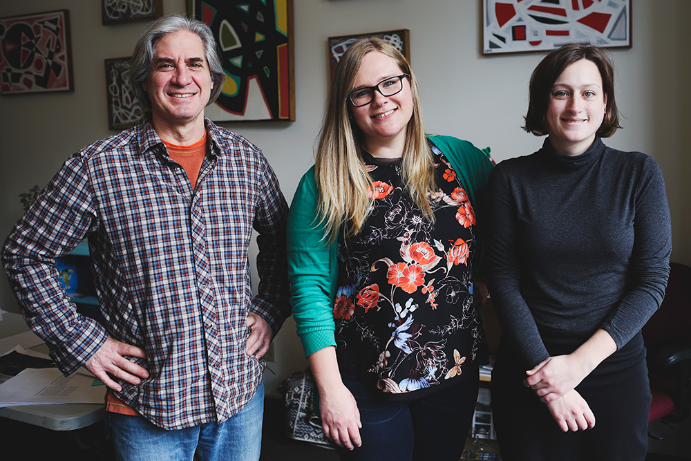 The LP team last year during final proofing of our first print edition, <a href="https://www.limestonepostmagazine.com/product/a-sense-of-place/" target=“_blank">‘A Sense of Place.’</a> (l-r) Cofounder and Publisher Ron Eid, Cofounder and Editorial Director Lynae Sowinski, and Marketing &amp; Advertising Director Emily Winters | Photo by Chaz Mottinger