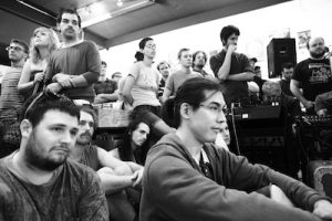 Fans watch Sonic Youth bandmembers Lee Ranaldo and Steve Shelley during an in-store performance at Landlocked in 2012. | Photo by Jeremy Hogan