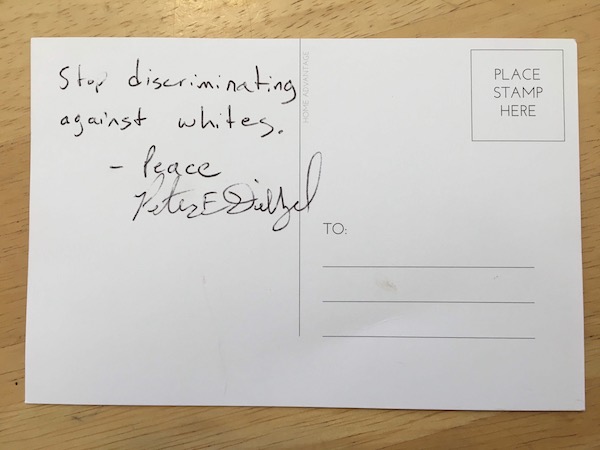 This fall, the Purple Shirt Brigade handed out postcards at the Farmers’ Market for people to write about how white supremacy in the market makes them feel. The cards would be sent to Mayor John Hamilton. This card was signed by ‘Peter E Diezel.’ In April, the <a href="https://chicago.suntimes.com/2019/4/27/18623600/how-groups-tied-to-white-nationalists-are-targeting-chicago-and-kim-foxx" target="“_blank&quot;">Chicago Sun-Times website</a> reported an Indiana man identified as Peter Diezel was associated with Identity Evropa and posted tweets defending Adolf Hitler. | Courtesy photo