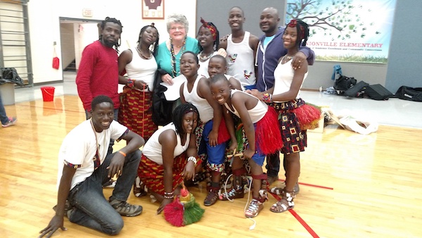 The dance troupe Dance of Hope with Lotus volunteer Kathy Aiken (back row, third from left) at Unionville Elementary School in 2018. | Photo courtesy of Lotus Education &amp; Arts Foundation