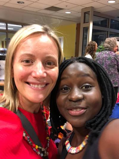 Laura Patterson (left) with a member of Dance of Hope from Uganda. | Photo courtesy of Laura Patterson