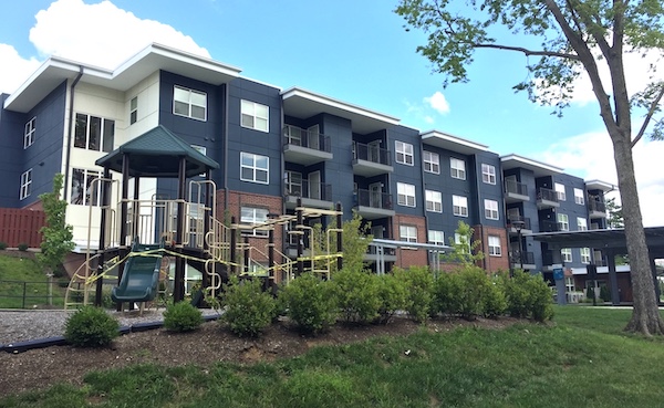 Deborah Myerson of SCIHO says that where people live is more than just “bricks and sticks.” It’s a community. “Maybe there are neighbors you are really tight with, and you did stuff for each other, and if you move, you don’t have that anymore,” she says. Pictured is B-Line Heights, an affordable housing project on North Rogers Street. | Limestone Post