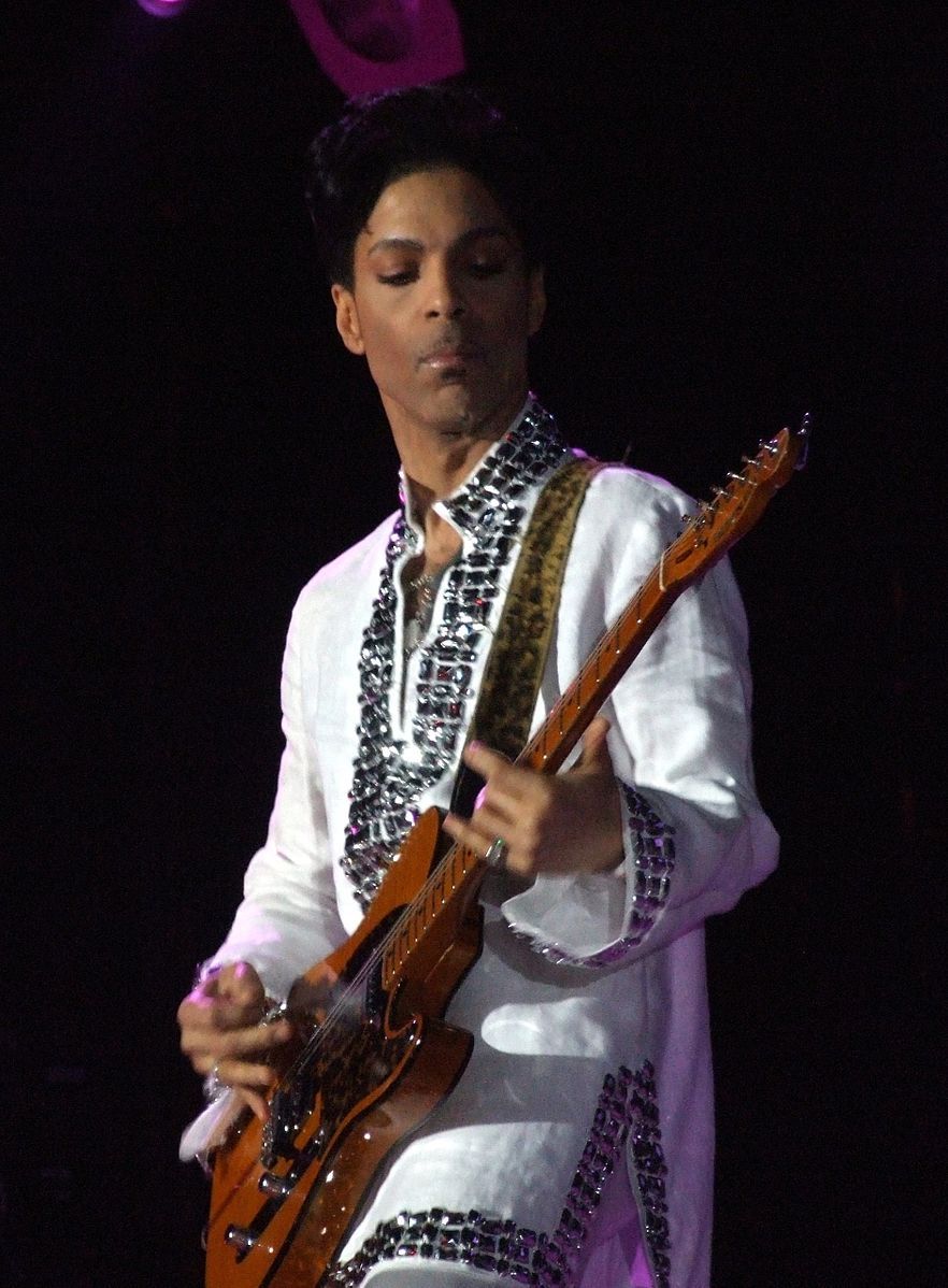 Prince, by <a href="https://commons.wikimedia.org/wiki/File:Prince_at_Coachella_(cropped).jpg">penner</a>, <a href="https://creativecommons.org/licenses/by-sa/3.0">CC BY-SA 3.0</a>, via Wikimedia Commons